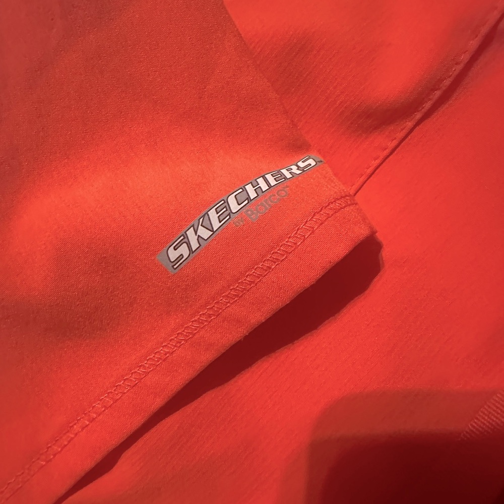 Beautiful Sketchers scrubs , coral size med